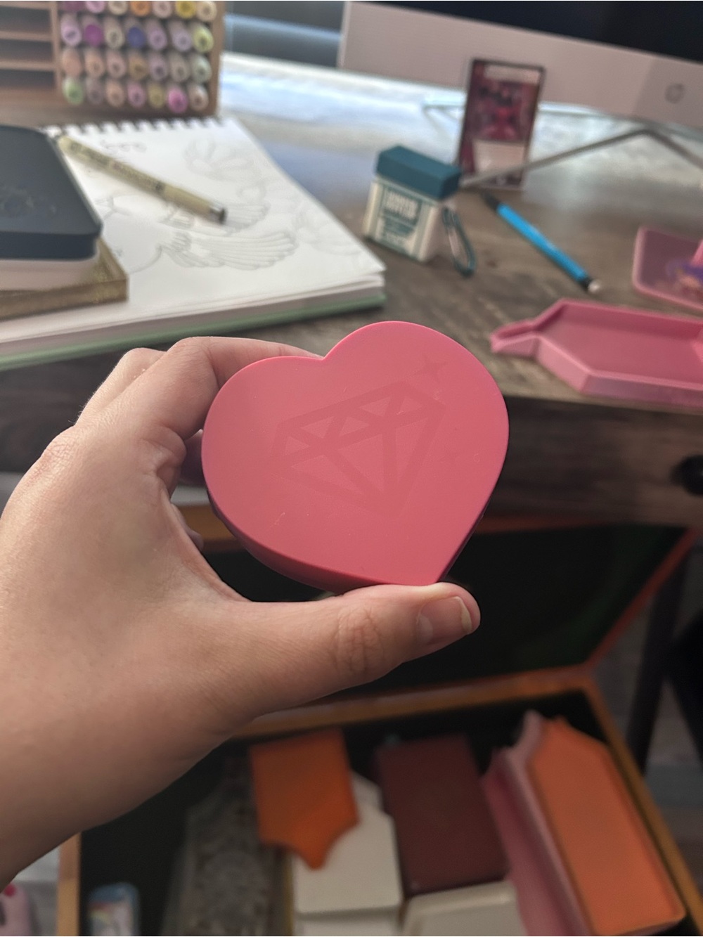 Pink Heart-Shaped Compact with Diamond Logo